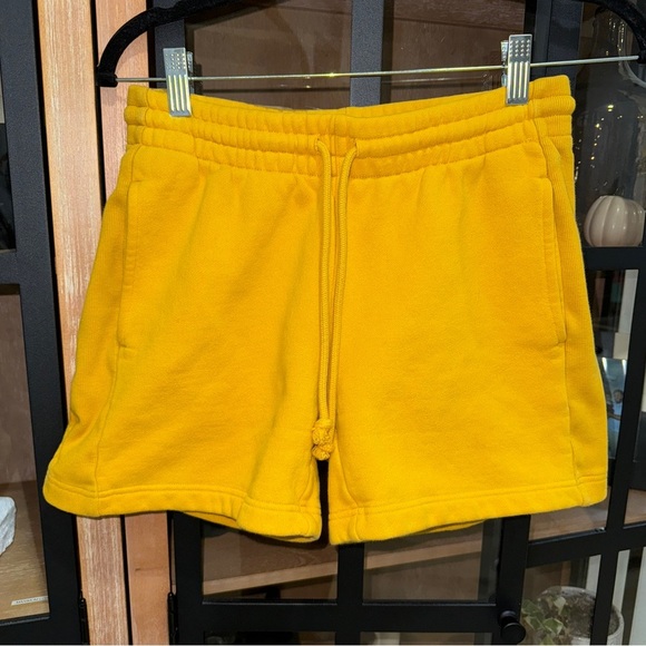 Aritzia TNA Cozy fleece sweatpants shorts yellow drawstring ribbed pockets - Picture 1 of 7